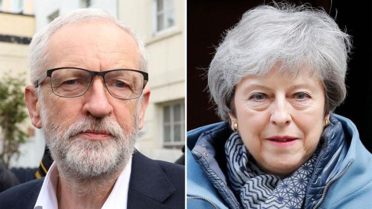 Jeremy Corbyn y Theresa May.-ISABEL INFANTES (AFP)