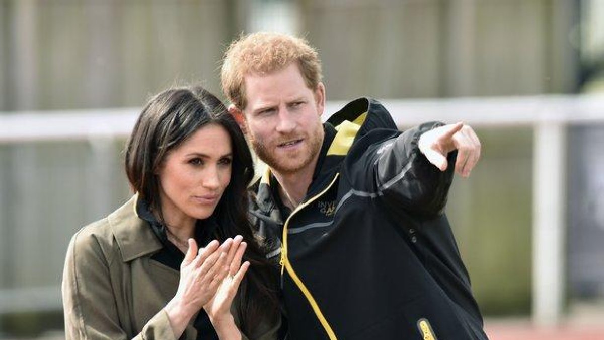 Meghan Markle y el príncipe Enrique.-EFE / NEIL MUNNS