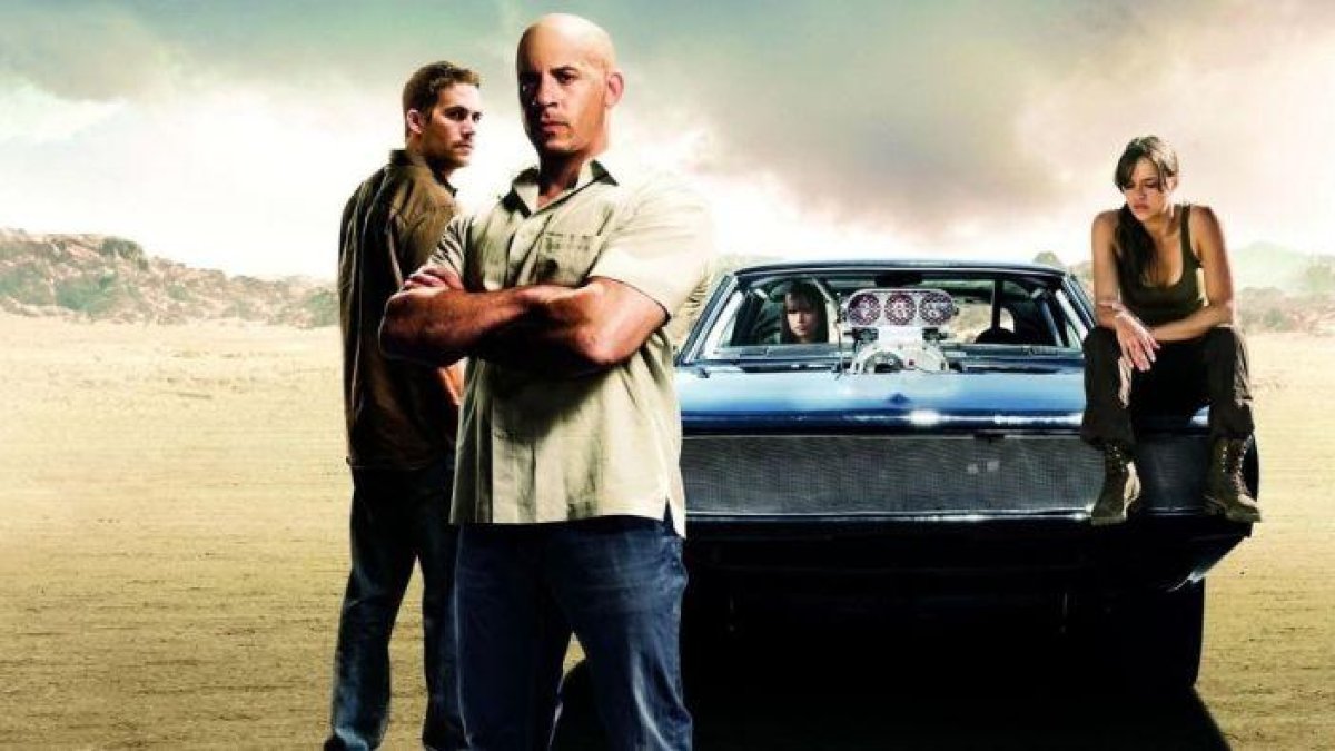 Paul Walker, Vin Diesel, Jordana Brewster y Michelle Rodríguez, en una imagen promocional de 'Fast & Furious 5'.-