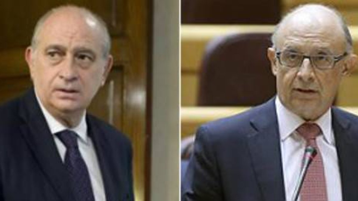 Los ministros del Interior, Jorge Fernández Díaz, y de Hacienda, Cristóbal Montoro.-