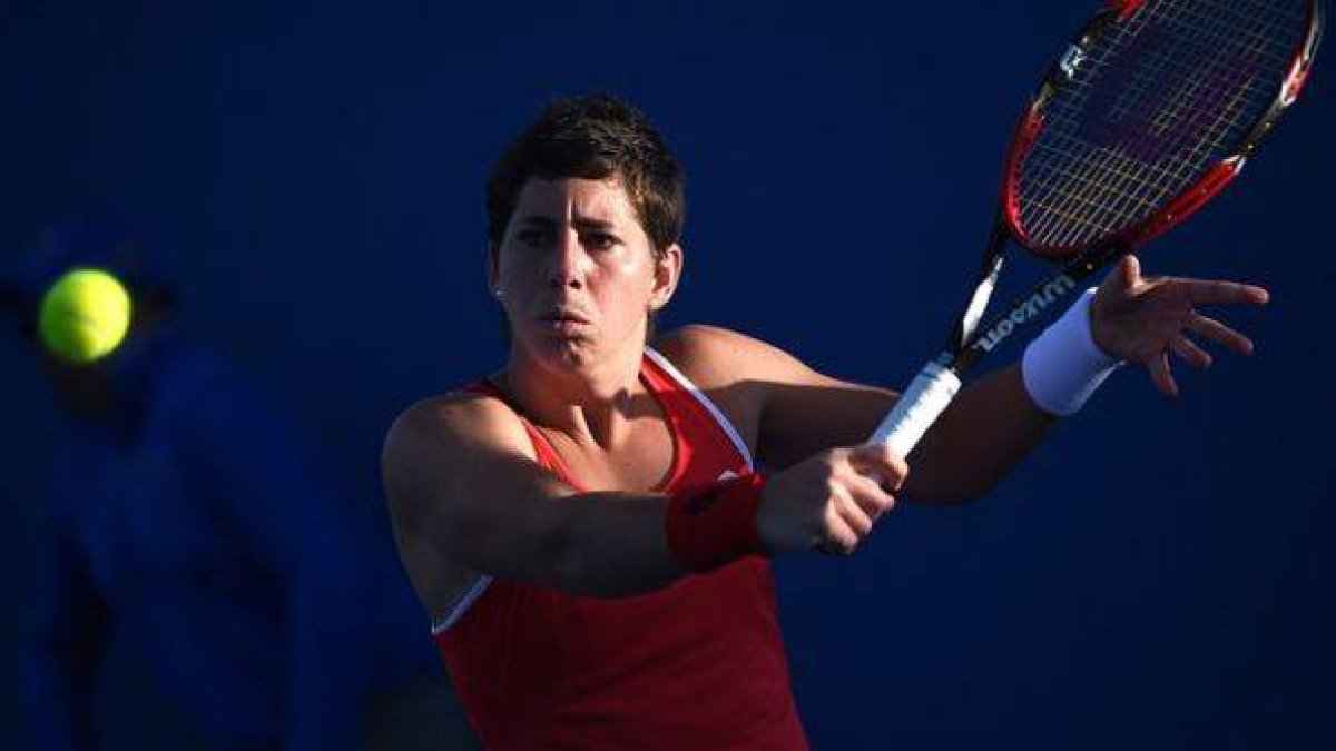 Carla Suárez, durante su debut en el Abierto de Australia, en el que cayó frente a la alemana Carina Witthoeft.-Foto: AFP / MANAN VATSYAYANA