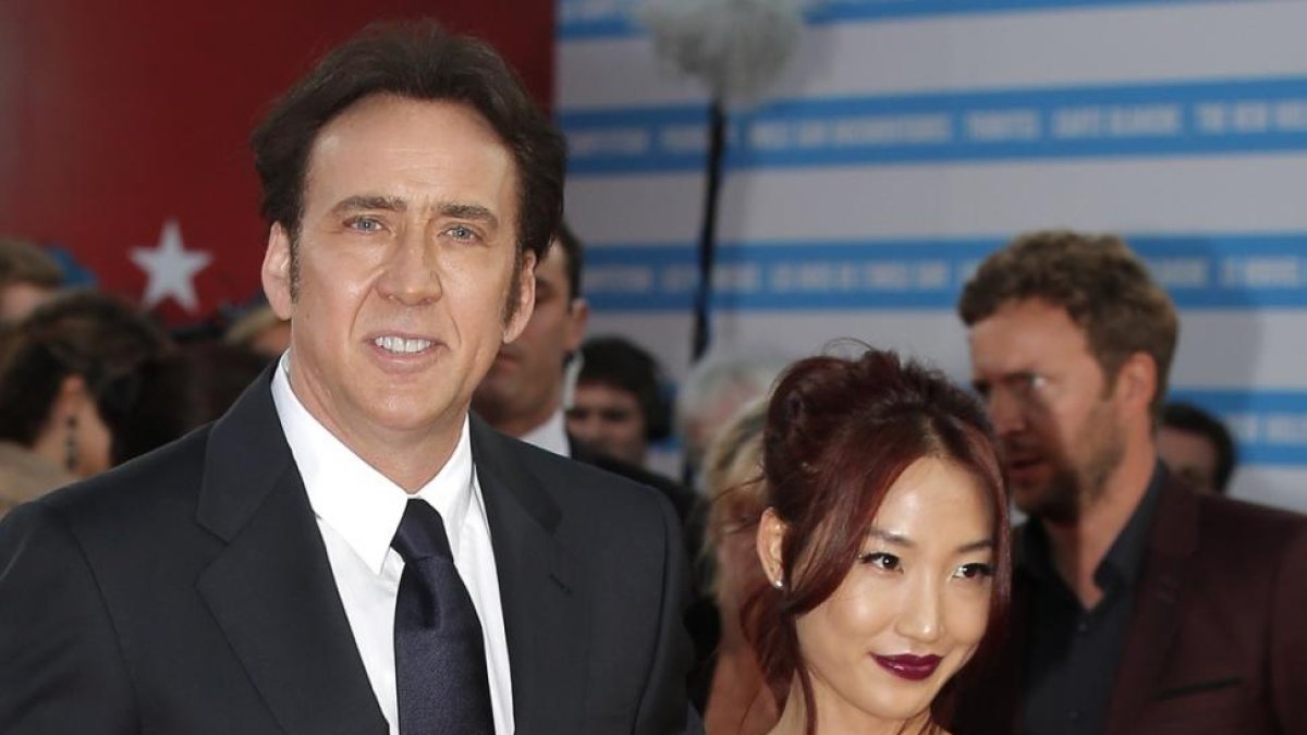 Nicolas Cage y Alice Kim, en el 2013.-AP / LIONEL CIRONNEAU