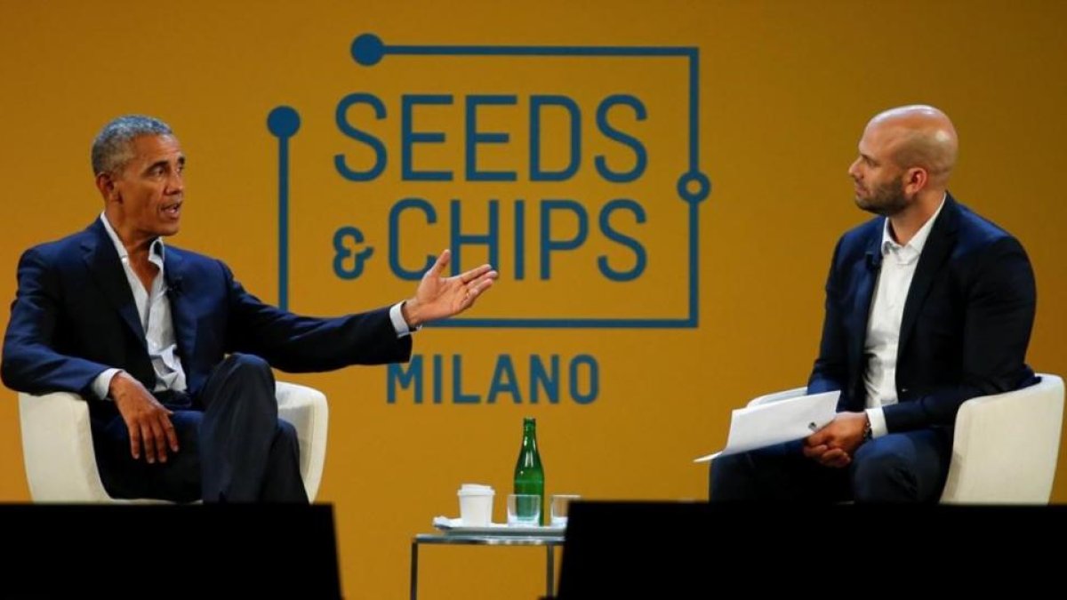 Obama, con el chef Sam Kass, este martes en Milán.-ALESSANDRO GAROFALO