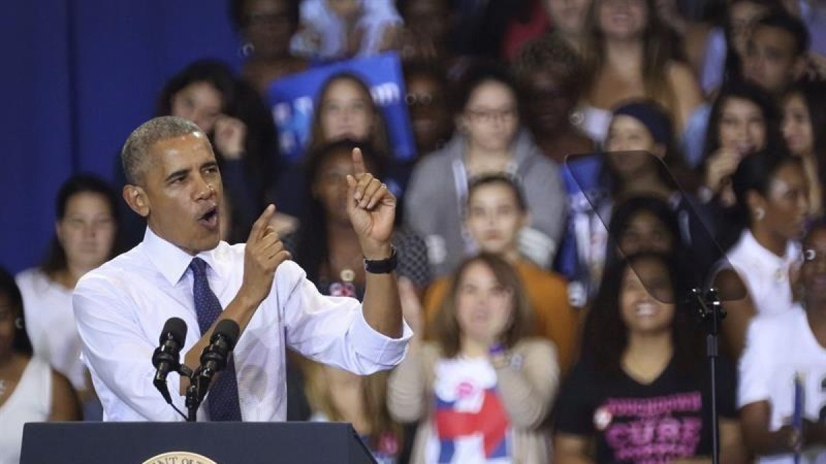 Mitin de Obama en que pide a los votantes que no crean que Trump va a defender a los trabajadores.-EFE