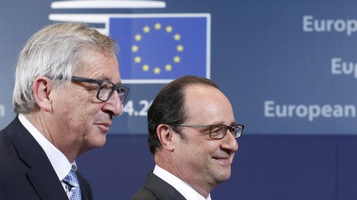 El presidente de la Comisión Europea, Jean-Claude Juncker, y el presidente francés, François Hollande.-EFE / JULIEN WARNAND
