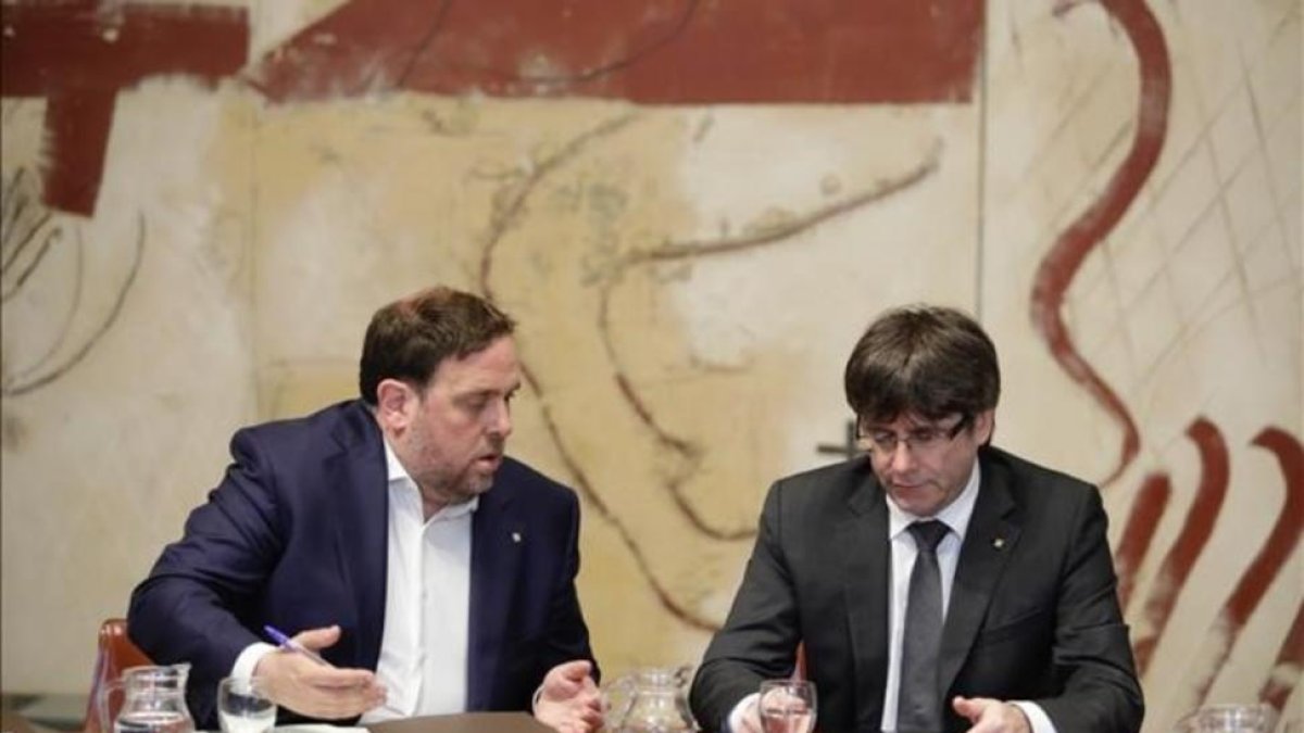 Oriol Junqueras y Carles Puigdemont.-FERRAN NADEU
