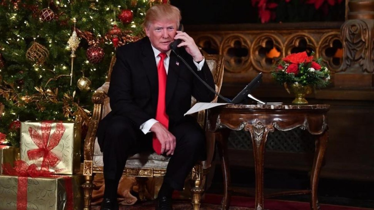 Donald Trump, en su residencia de Mar-a-Lago, en Florida, esta Navidad.-/ NICHOLAS KAMM (AFP)