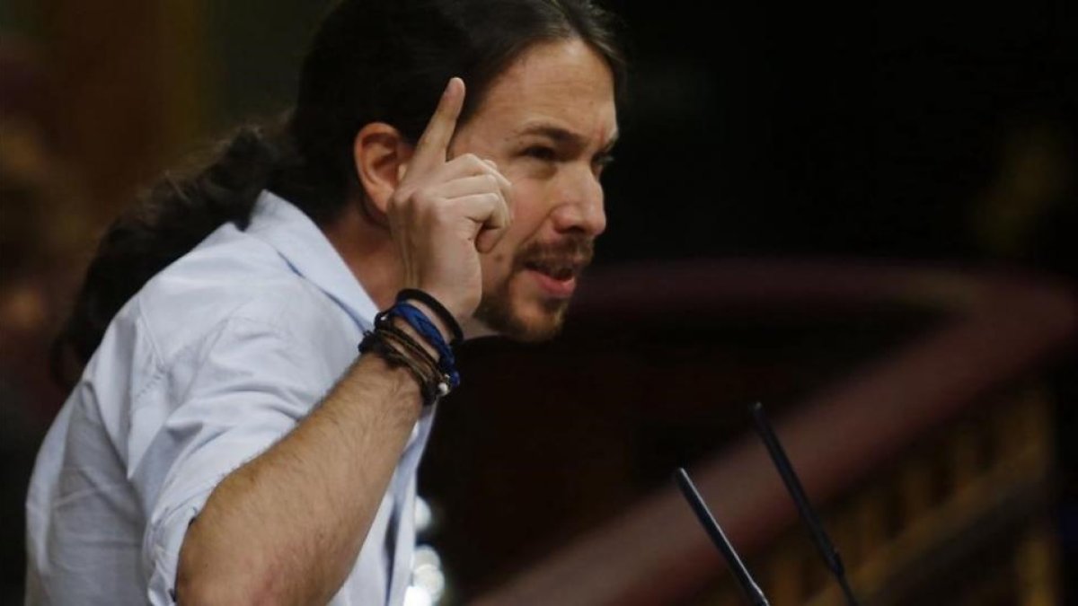 Pablo Iglesias, en la tribuna del Congreso durante la sesión de investidura de Mariano Rajoy.-AGUSTIN CATALAN