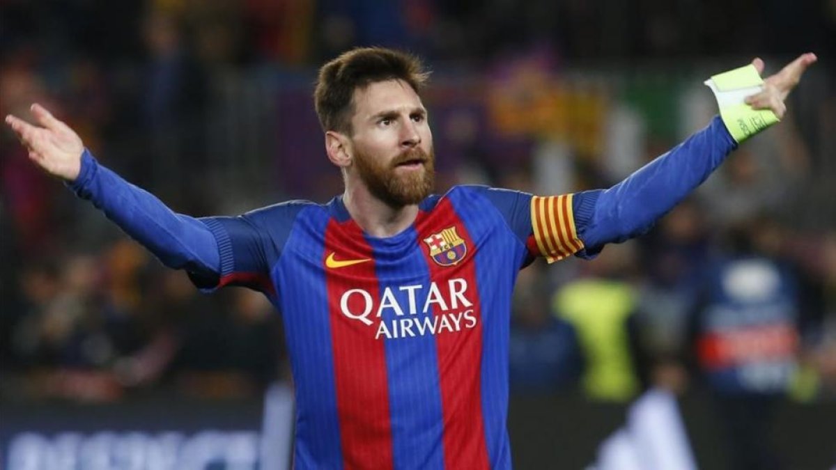 Messi celebra el pase del Barcelona a los cuartos de final de la Liga de Campeones.-AFP / PAU BARRENA