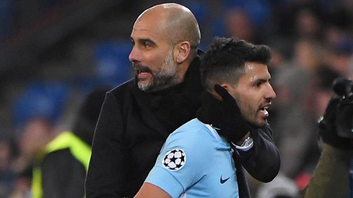 Guardiola y Aguero, durante el partido de la Champions Basilea-Manchester City.-PATRICK HERTZOG