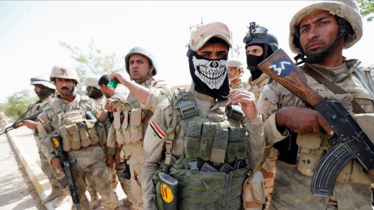 Soldados del Ejército iraquí en el centro de Faluya.-REUTERS / THAIER AL-SUDANI
