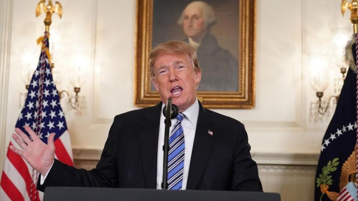 Trump habla sobre el tiroteo de Florida, en la Casa Blanca, el 15 de febrero.-/ AFP / MANDEL NGAN