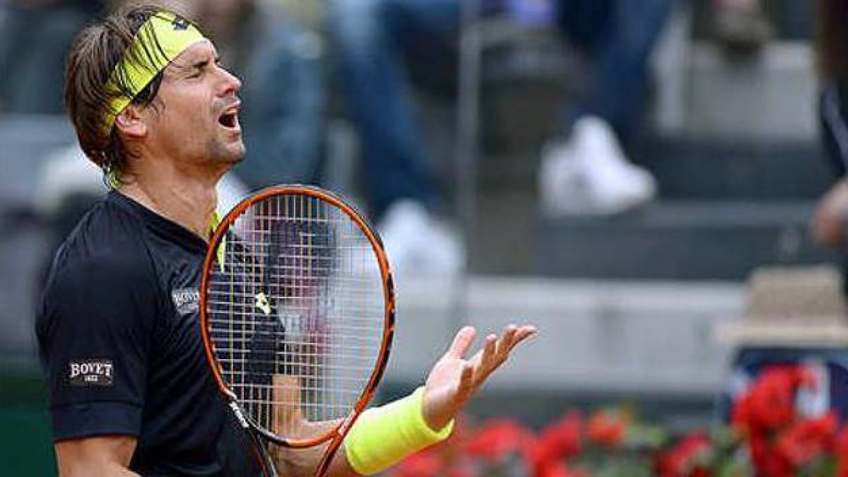 David Ferrer se lamenta durante un partido contra el serbio Novak Djokovic.-Foto: FILIPPO MONTEFORTE / AFP