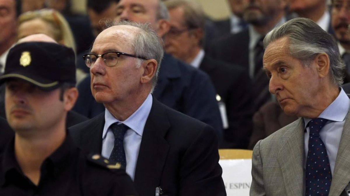 Rato y Blesa, en el banquillo.-