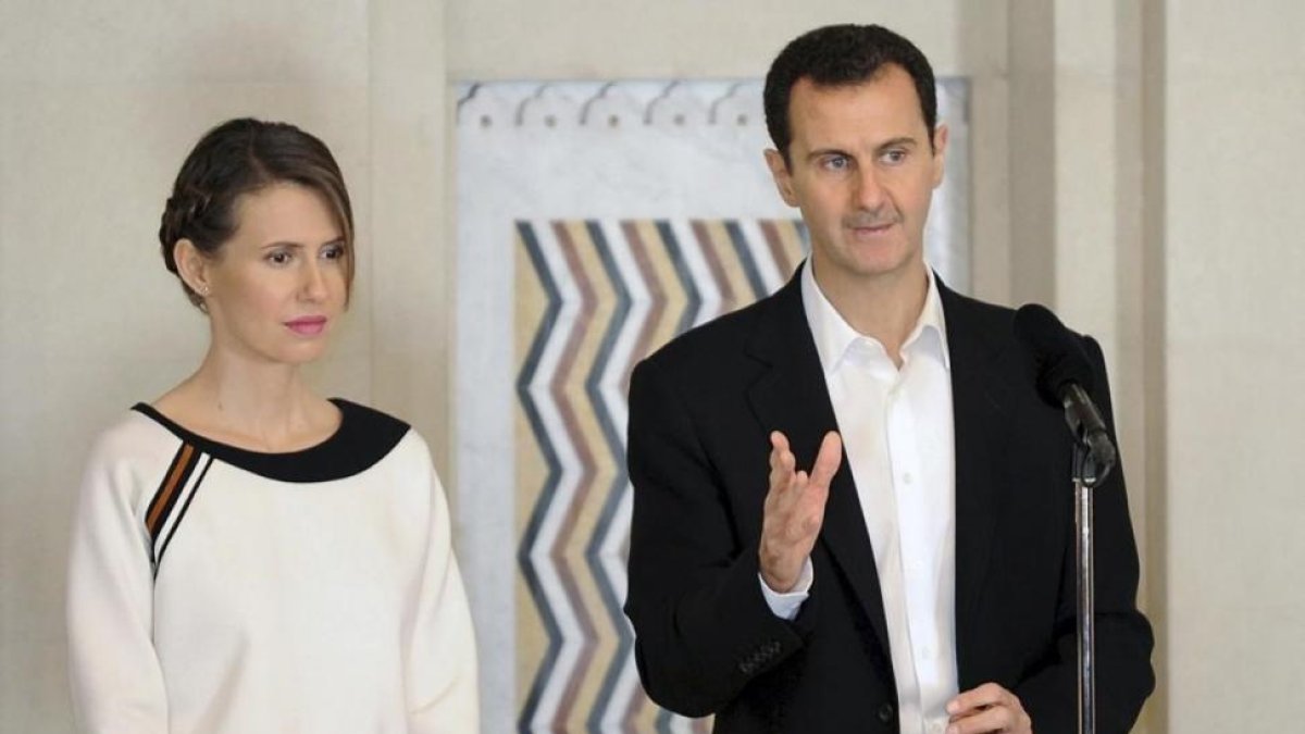 Asma al Asad, junto a su esposo, Bashar.-SANA