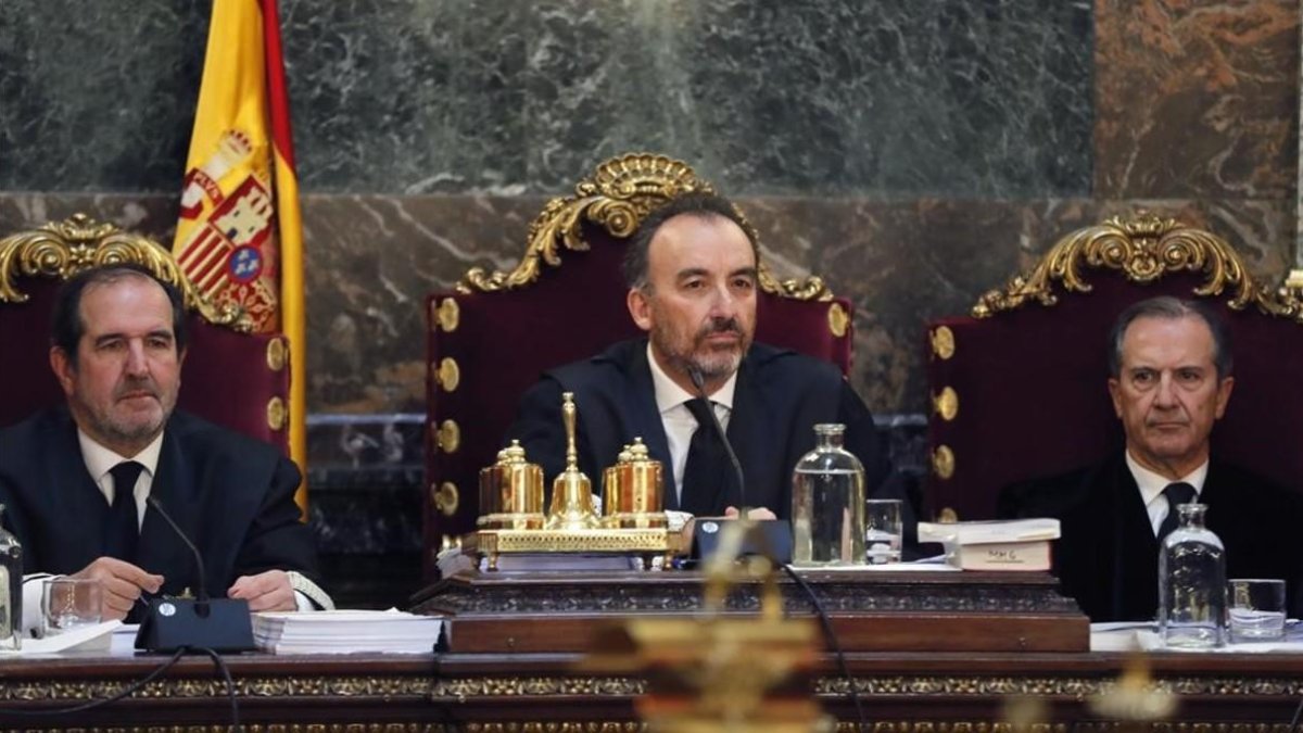 Los tres magistrados del Tribunal Supremo que compusieron la vista del caso Nóos. De izquierda a derecha: Andrés Martínez Arrieta, Manuel Marchena y Miguel Colmenero.-EFE