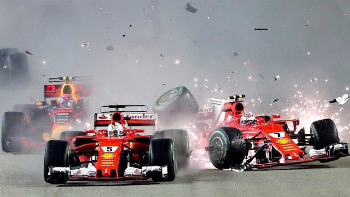 El accidente entre Vettel y Kimi Raikkonen.-EFE