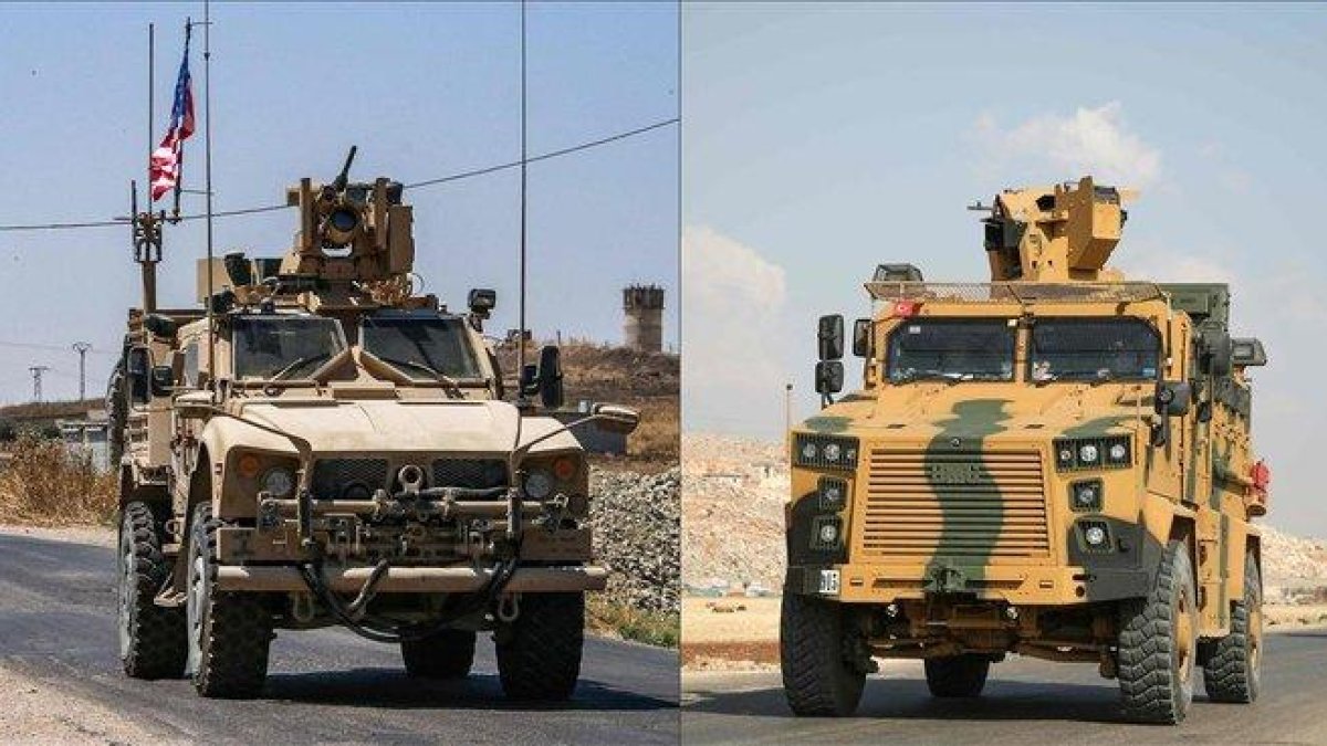 Vehículos blindados de la coalición liderada por EEUU en la ciudad de Ras al-Ain.-AAREF WATAD (AFP)