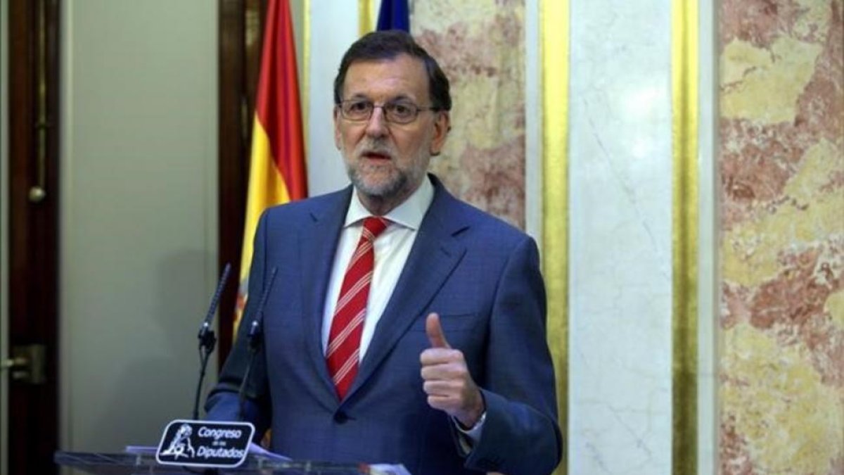 Mariano Rajoy, en rueda de prensa en el Congreso.-DAVID CASTRO