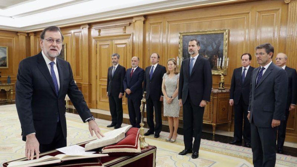 La jura de Mariano Rajoy como presidente del Gobierno, el pasado lunes, en la Zarzuela.-Ángel Díaz / EFE