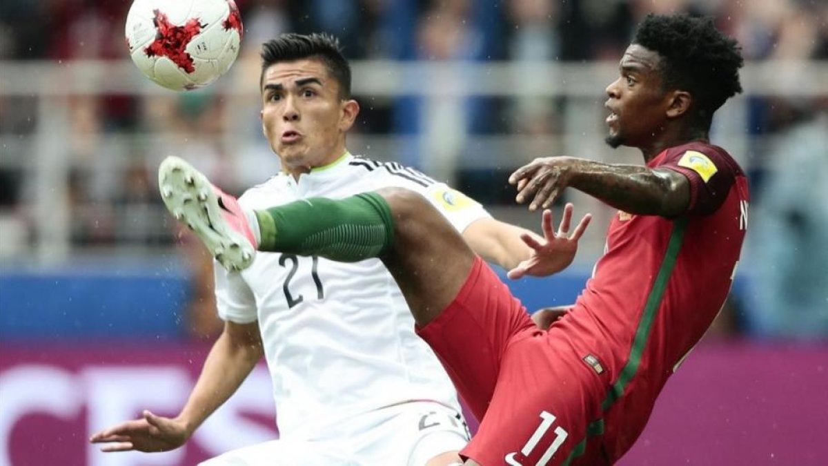 Nelson Semedo (derecha), con Portugal.-AP / DENIS TYRIN