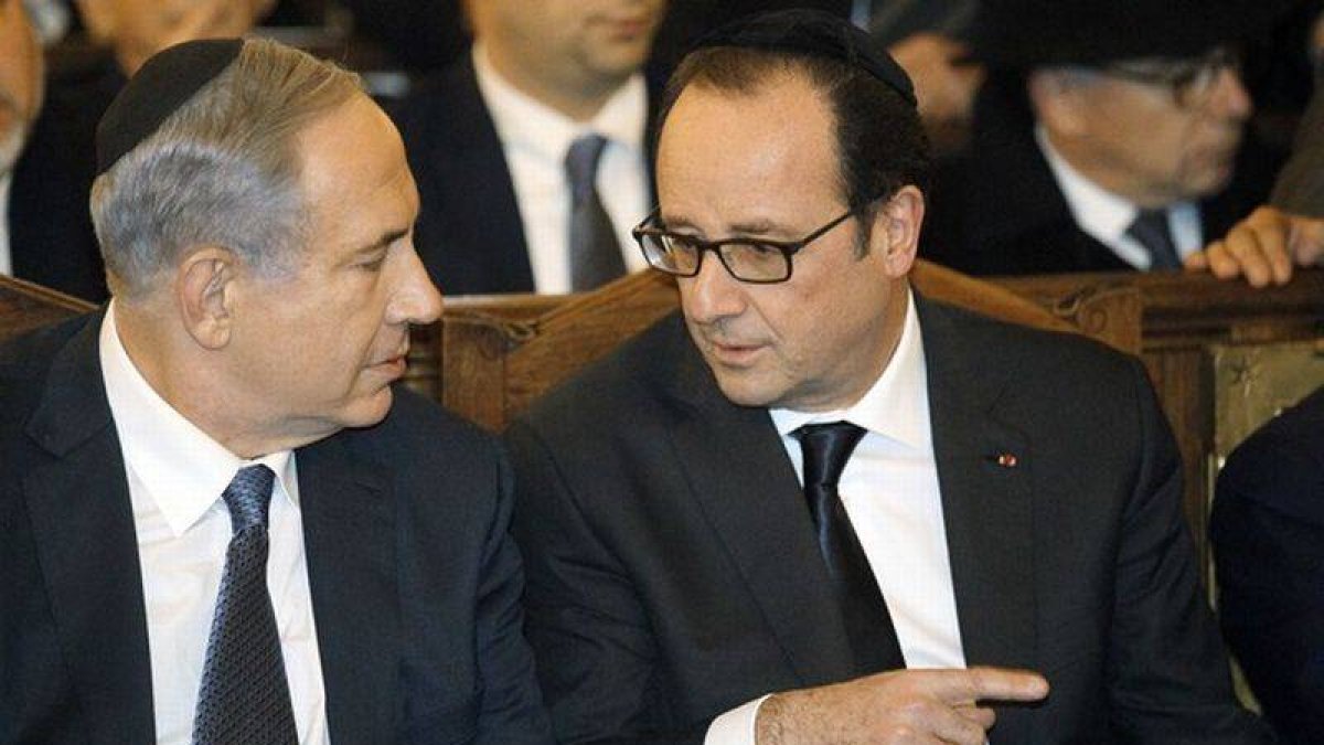 Benjamin Netanyahu y Francois Hollande en la Gran Sinagoga de París.-Foto: REUTERS