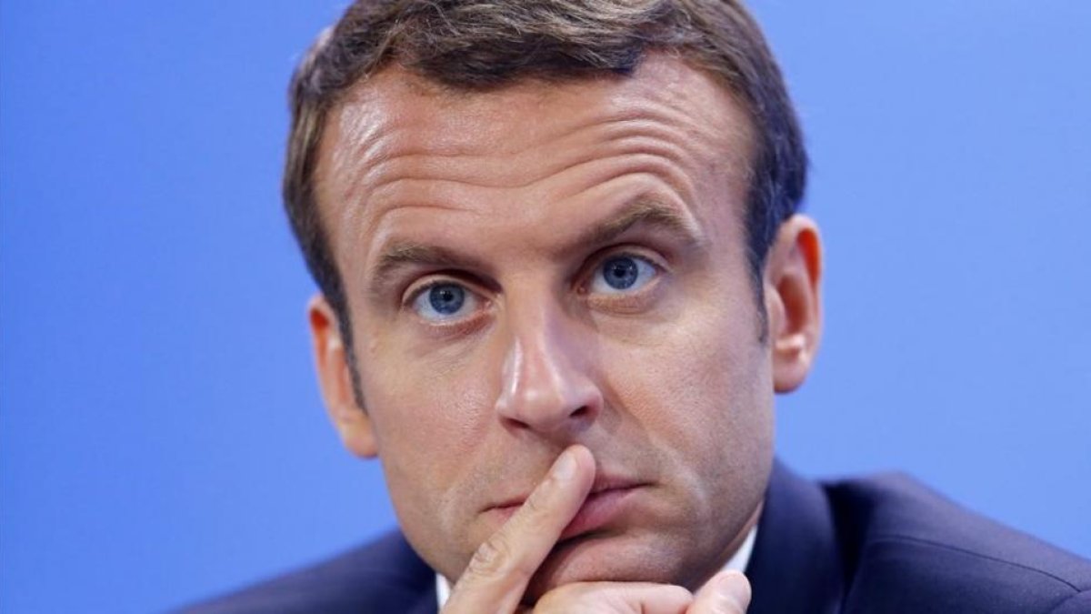 Emmanuel Macron en rueda de prensa en Berlín.-REUTERS / HANNIBAL HANSCHKE