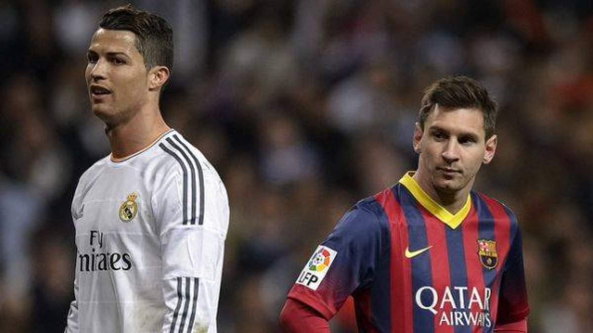 Cristiano Ronaldo y Leo Messi, en el Bernabéu, el pasado 23 de marzo, en el último clásico liguero de la temporada 2013-2014.-Foto: AFP / DANI POZO