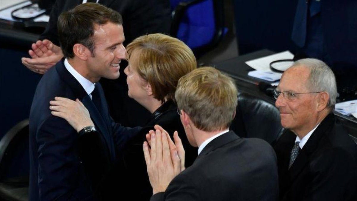 Merkel felicita a Macron tras su discurso en el Bundestag.-JOHN MACDOUGALL AFP