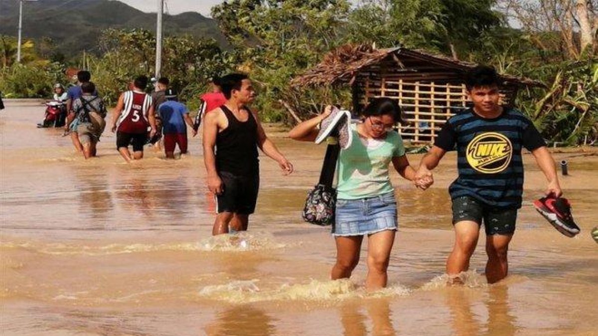 Inundaciones en Filipinas tras el paso  de un tifón.-EFE