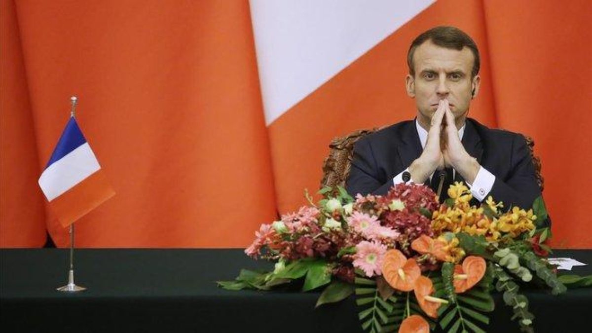 El presidente francés, Emmanuel Macron, durante la rueda de prensa conjunta con su homólogo chino, Xi Jinping, esta semana, en Pekín.-JASON LEE (AP)