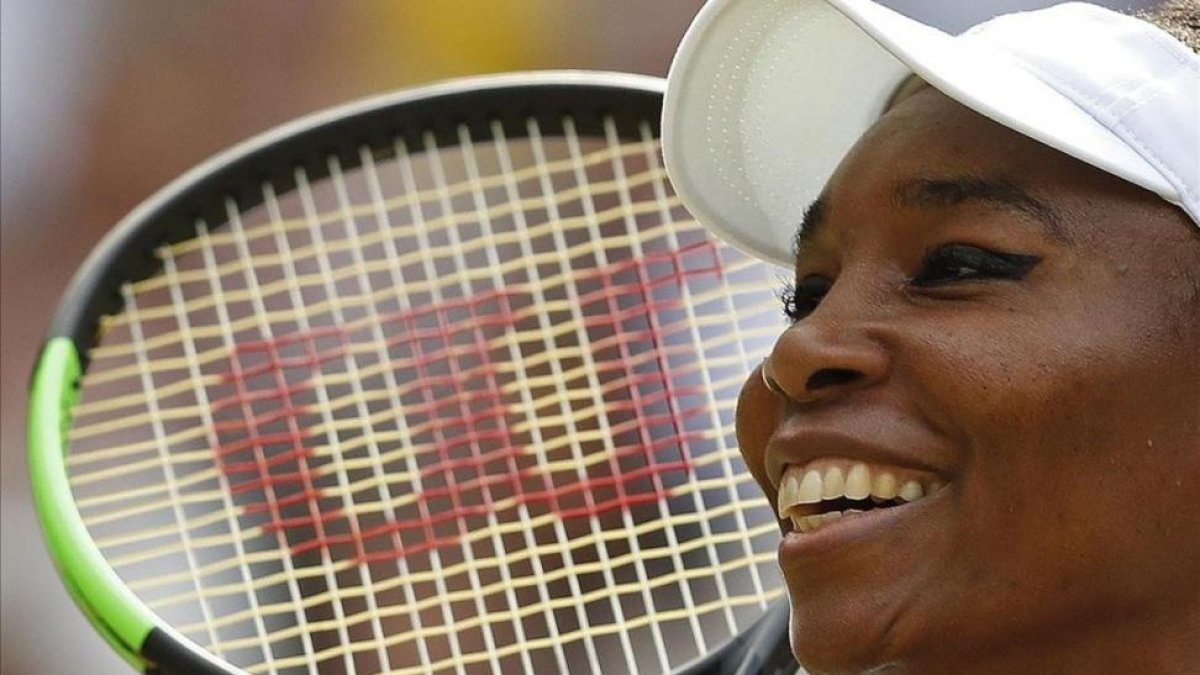 Venus Williams, feliz tras ganar a Konta y pasar a la final de Wimbledon.-AFP / ADRIAN DENNIS