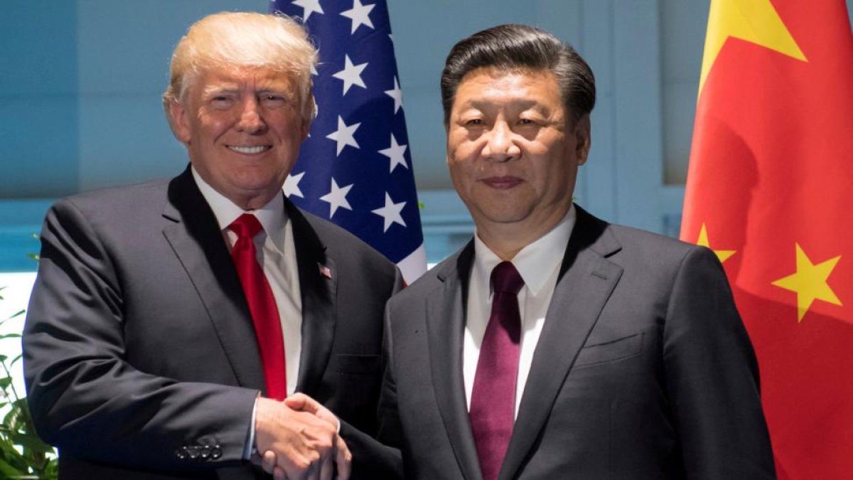 Trump y Xi Jinping, el pasado 8 de julio, en Hamburgo.-POOL (REUTERS)