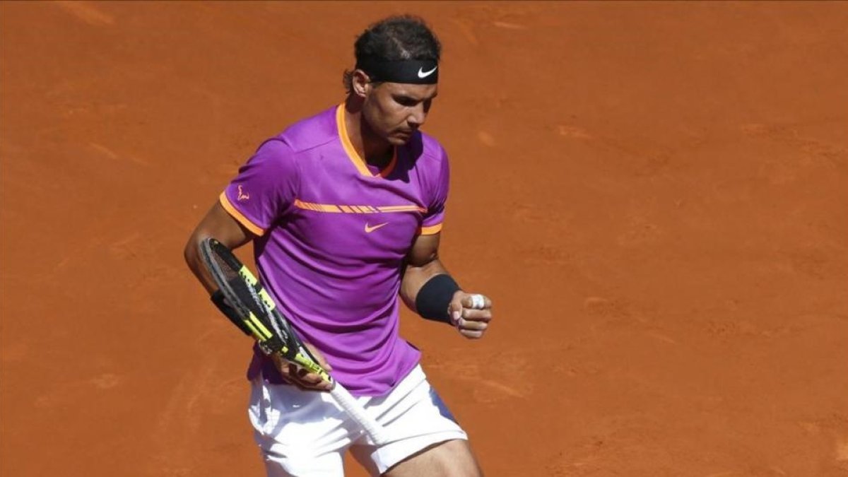 Rafael Nadal celebra su victoria ante Djokovic.-EFE / KIKO HUESCA