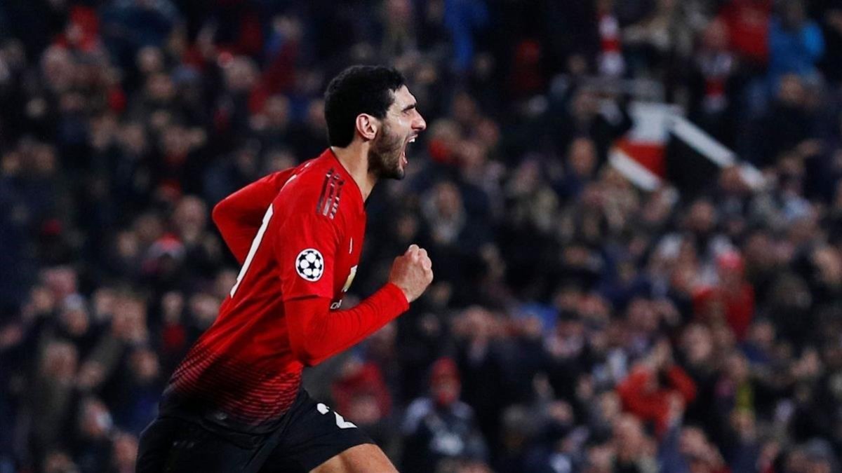 Fellaini celebra su gol en el minuto 91 que clasifica al United y elimina al Valencia.-REUTERS