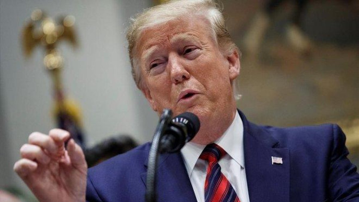 El presidente estadounidense, Donald Trump, durante una rueda de prensa en la Casa Blanca, este jueves.-SHAWN THEW (EFE)