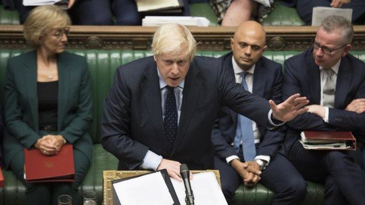 El primer ministro británico, Boris Johnson, en el Parlamento, este martes.-AP / JESSICA TAYLOR