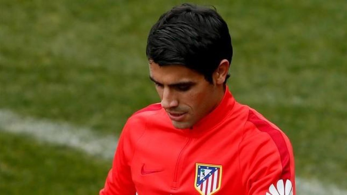 Augusto, en su primer entrenamiento con el Atlético.-EFE / JUANJO MARTÍN