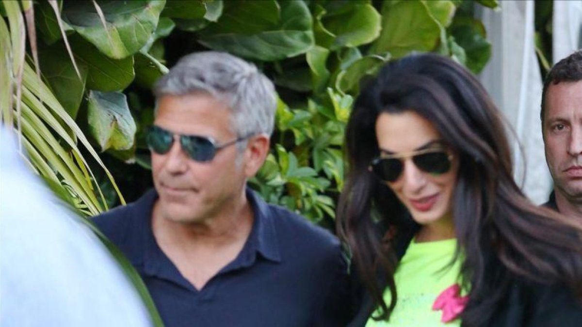 George Clooney y Amal Alamuddin.-