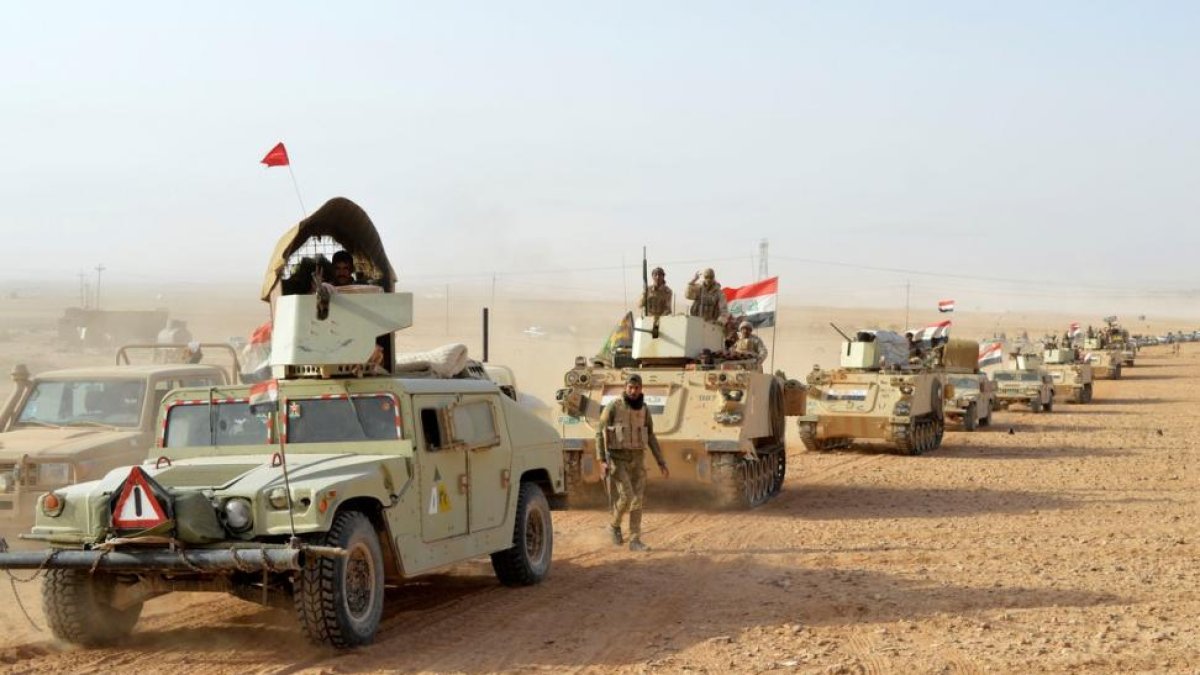 Las tropas de Irak después de liberar la ciudad de Rawa del Estado Islámico (EI). 17 de noviembre de 2017.-REUTERS / OSAMAH WAHEEB