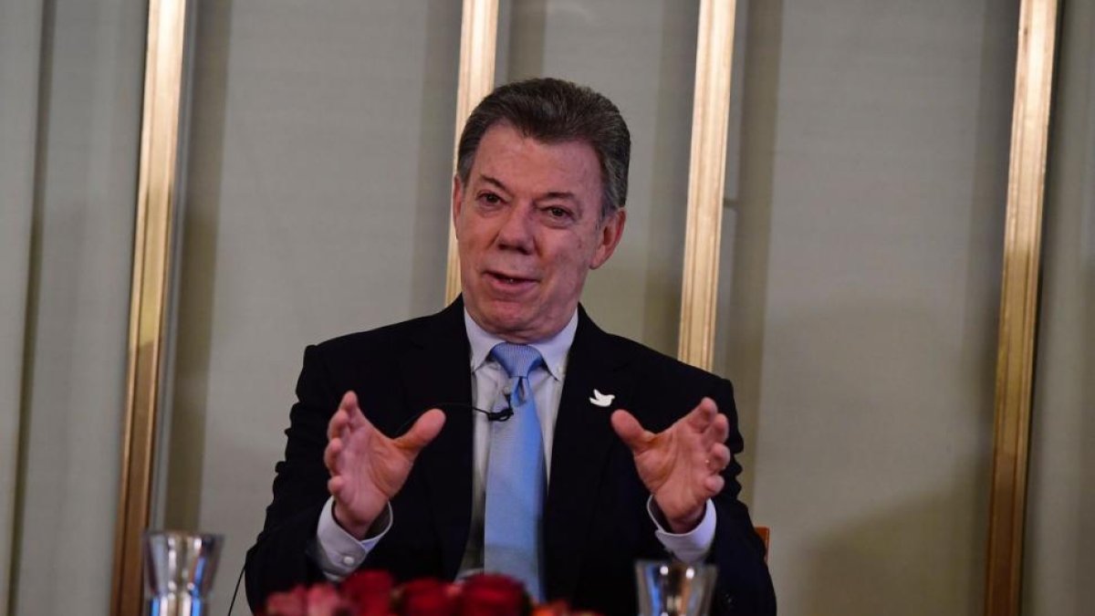 Santos, durante su comparecencia en Olso, el día antes de recibir el Nobel de la Paz.-TOBIAS SCHWARZ / AFP