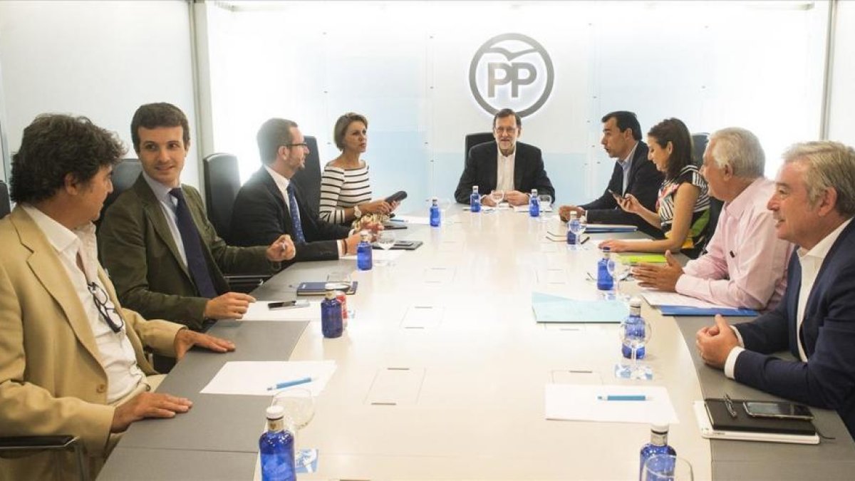 El líder del PP, Mariano Rajoy, al frente de una reciente reunión de su comité de dirección tras verse con Albert Rivera-EFE