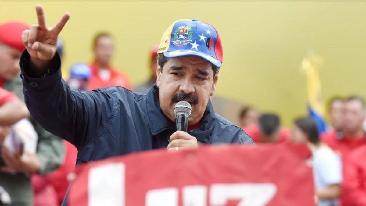 Maduro en la fiesta del Primero de Mayo en Caracas.-AFP / JUAN BARRETO