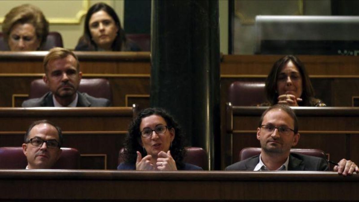 Turull, Rovira y Herrera escuchan a Rajoy, el 8 de abril del 2014 en el Congreso.-SERGIO PEREZ