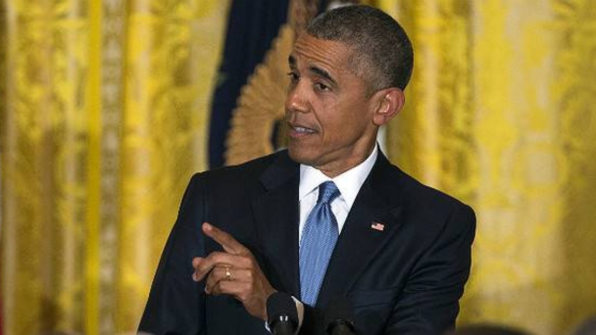 Obama, contestando a la activista en la recepción en la Casa Blanca-Foto: AP / EVAN VUCCI