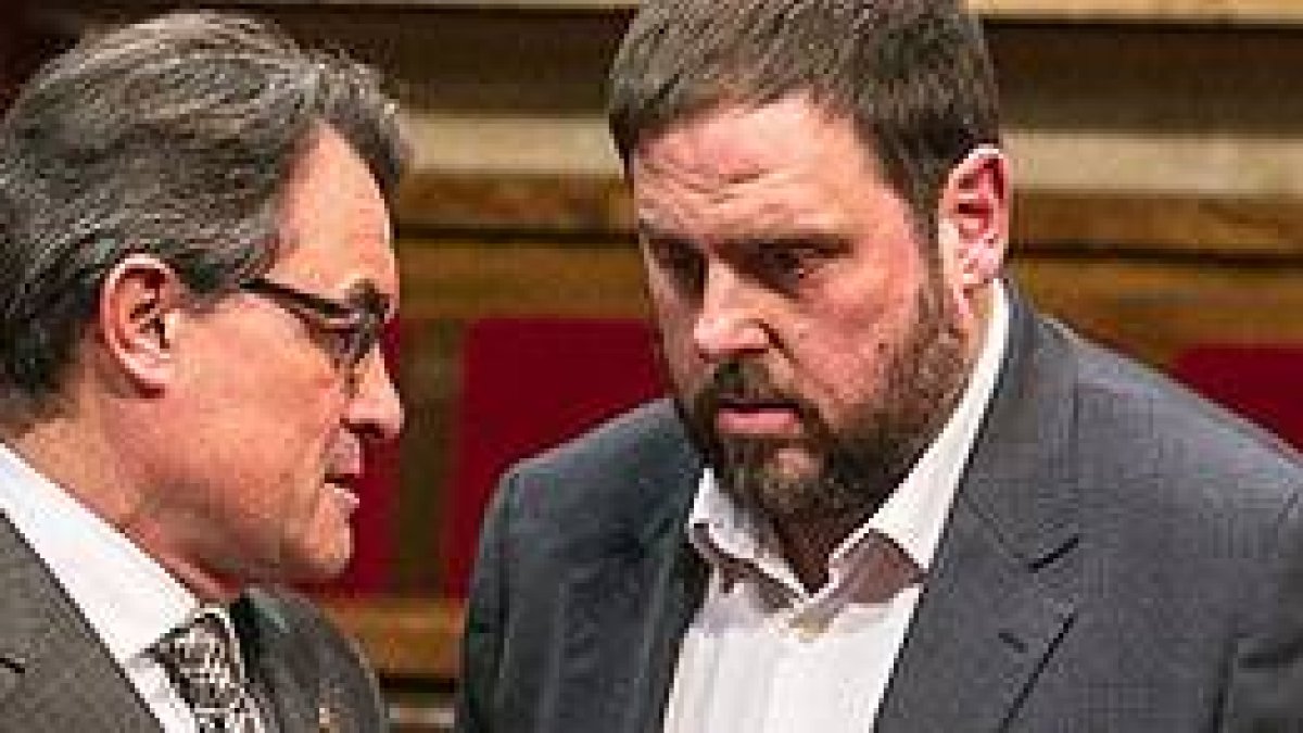 Artur Mas y Oriol Junqueras, en el Parlament.-