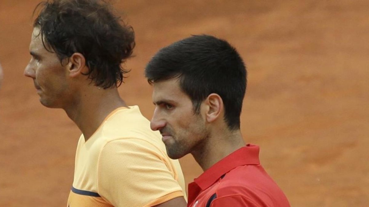 Nadal y Djokovic, este viernes en su nuevo duelo en Roma.-AP / ALESSANDRA TARANTINO