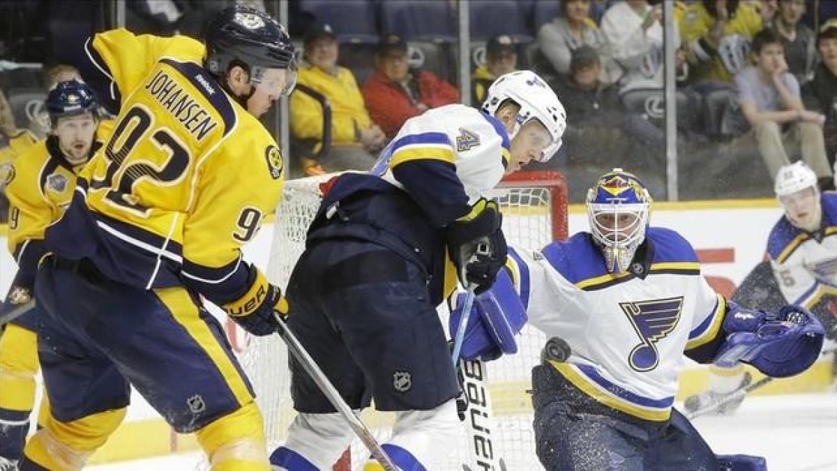 Imagen de archivo de un encuentro de hockey hielo.-AP / MARK HUMPHREY