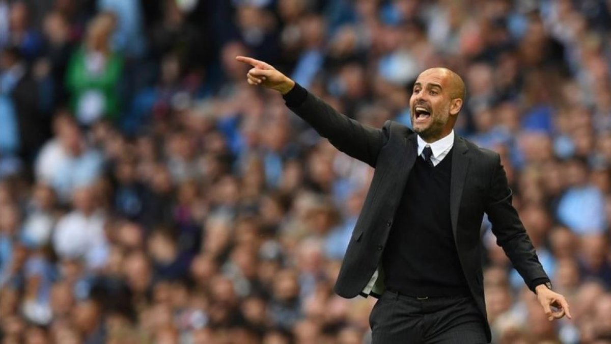 Guardiola, durante el partido ante el Sunderland.-AFP / PAUL ELLIS