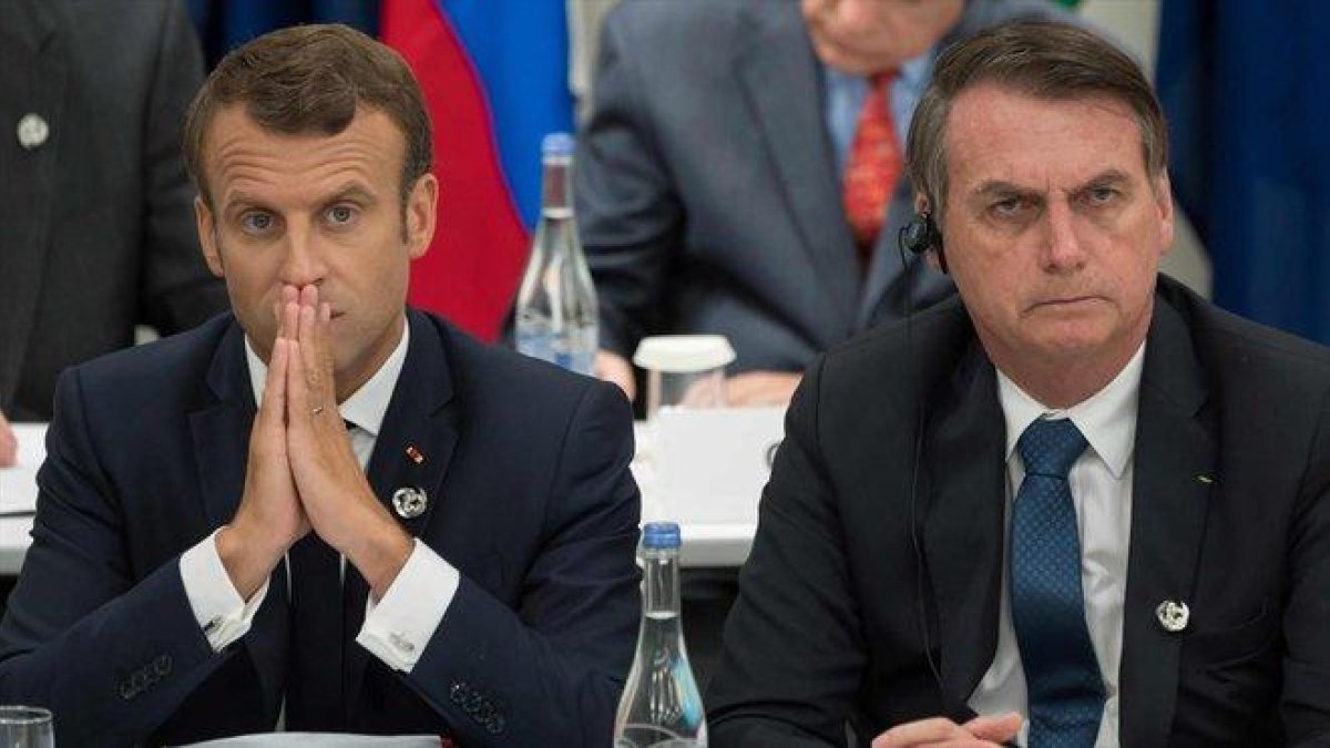 Macron y Bolsonaro, durante la cumbre del G-20 en Osaka.-JACQUES WITT (AFP)